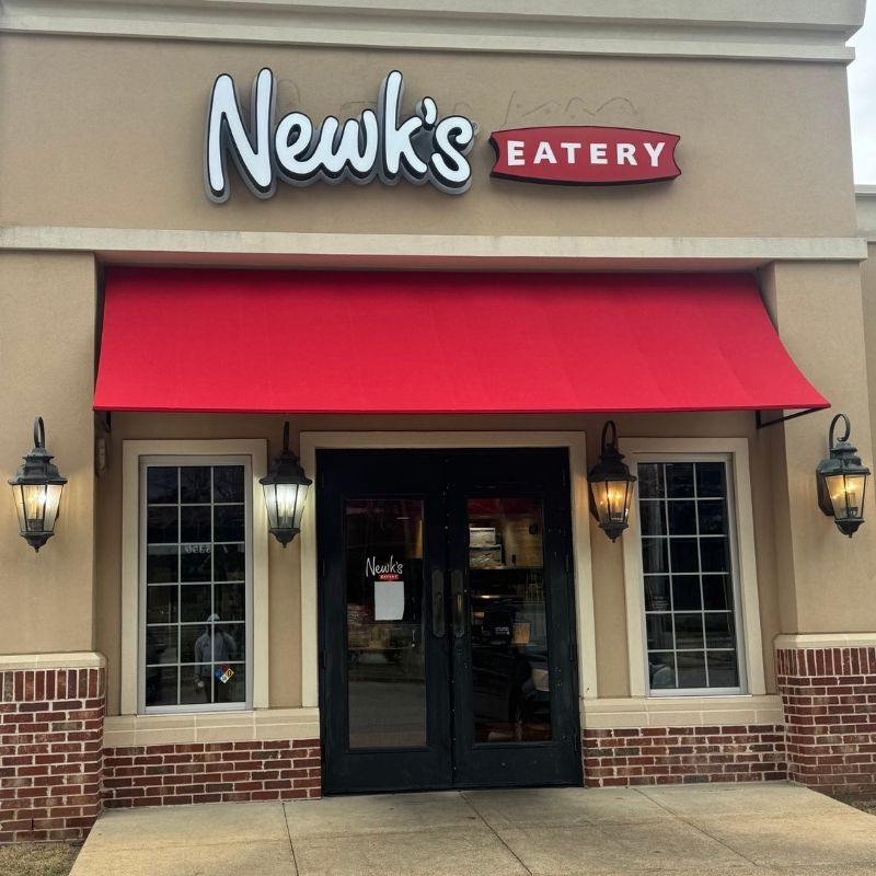 Red awning over store entrance