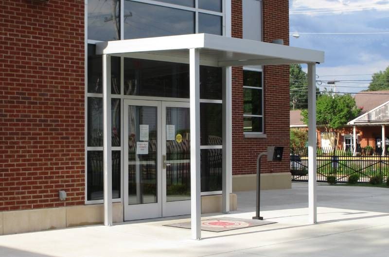 Metal Canopy with Posts over entryway