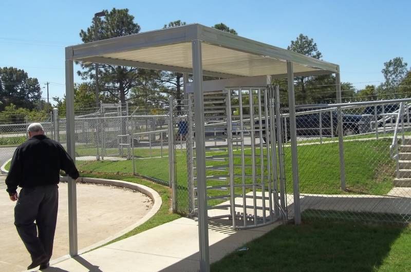 Metal Canopy with posts over entry turnstile