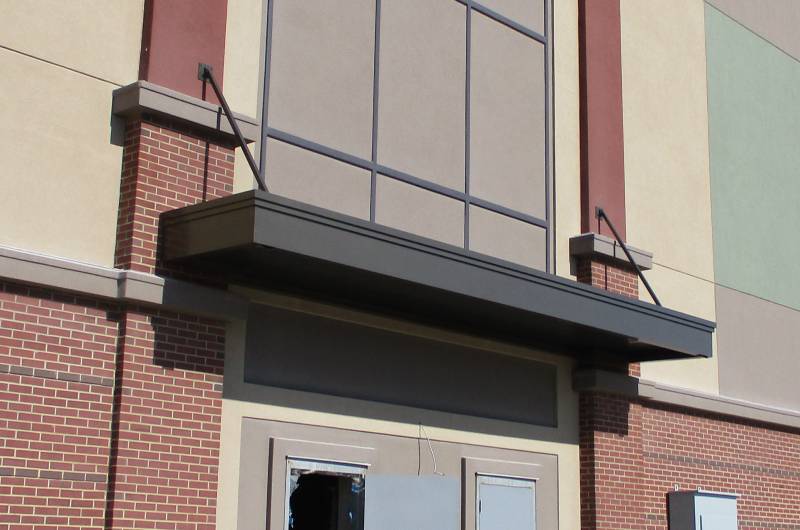 Suspended metal canopy 