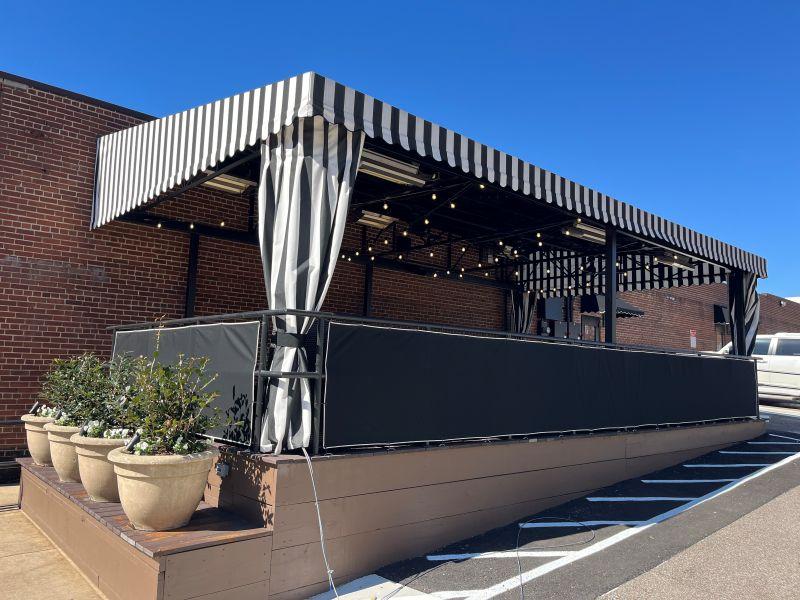 striped restaurant awning and outdoor curtains