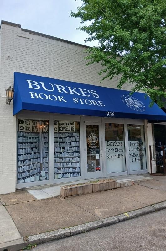 blue awning above storefront Burke's Book Store