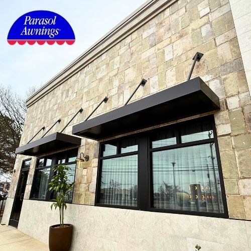 suspended canopy metal awnings over restaurant windows