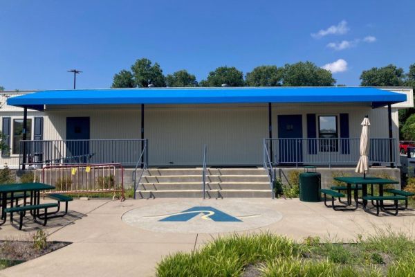 blue fabric canopy over patio