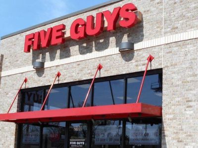 Suspended metal canopy for Five Guys